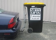 Wheelie bin transporter